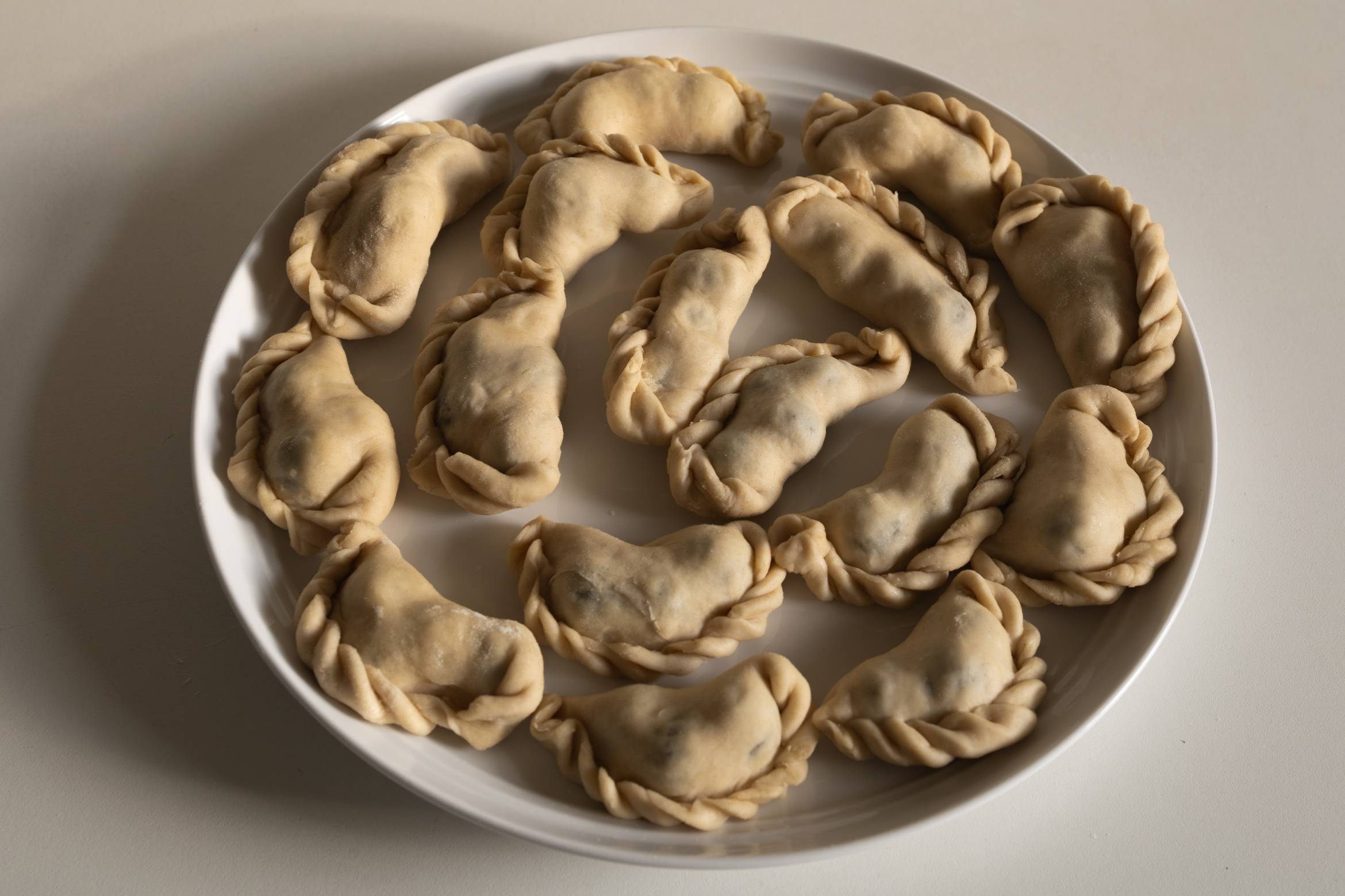 Polish homemade pierogi on a plate.